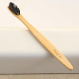 Bamboo Toothbrush with Activated Charcoal Bristles for oral health taken care by Nature